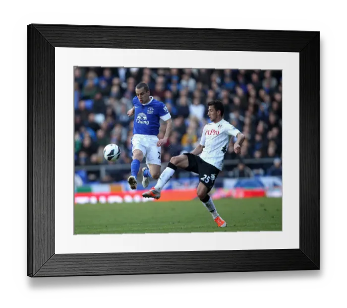 Framed Print : Battle for the Ball: Osman vs. Manolev - Everton's Supremacy over Fulham (1-0) Framed Print : Battle for the Ball: Osman vs. Manolev - Everton's Supremacy over Fulham (1-0)