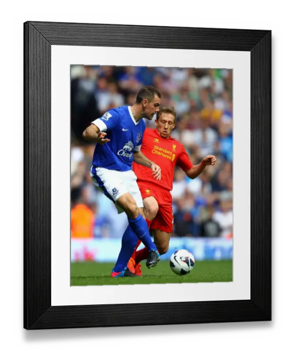 Framed Print : Battle for the Ball: Leiva vs. Gibson - Liverpool vs. Everton Rivalry in the Barclays Premier League (0-0) Framed Print : Battle for the Ball: Leiva vs. Gibson - Liverpool vs. Everton Rivalry in the Barclays Premier League (0-0)