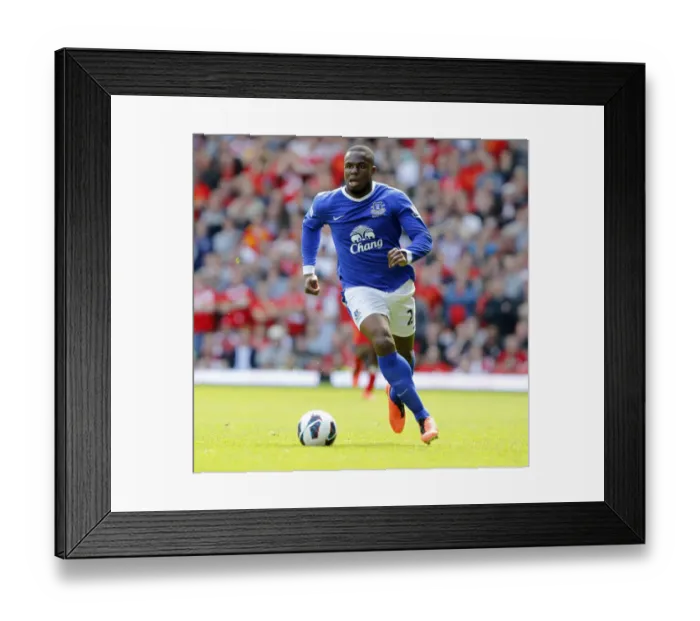 Framed Print : Determined Standoff: Anichebe's Battle at Anfield in the Premier League Rivalry (0-0, May 5, 2013)