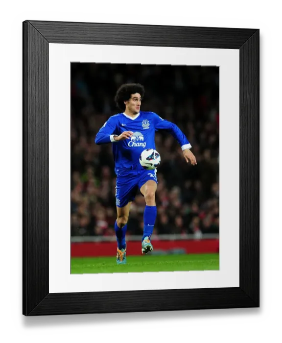 Framed Print : Marouane Fellaini's Intense Face-Off in the Scoreless Arsenal vs. Everton Barclays Premier League Match at Emirates Stadium (16-04-2013) Framed Print : Marouane Fellaini's Intense Face-Off in the Scoreless Arsenal vs. Everton Barclays Premier League Match at Emirates Stadium (16-04-2013)