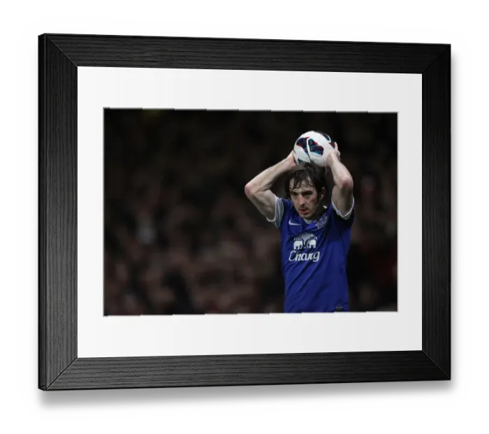 Framed Print : Arsenal vs. Everton: A Defensive Stalemate at Emirates Stadium featuring Leighton Baines (16-04-2013)