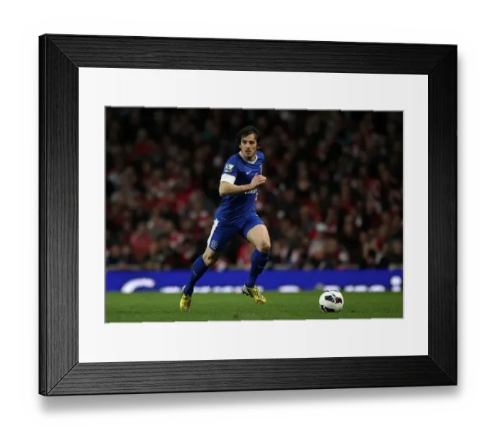 Framed Print : Arsenal vs. Everton: A Defensive Battle at Emirates Stadium - Leighton Baines Stands Firm for Everton (16-04-2013)