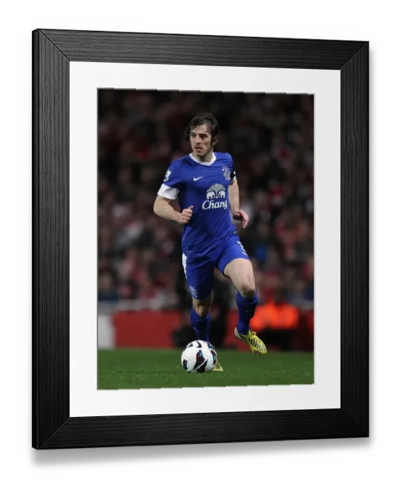 Framed Print : Defensive Battle at Emirates: Everton's Leighton Baines Holds Firm Against Arsenal (16-04-2013) Framed Print : Defensive Battle at Emirates: Everton's Leighton Baines Holds Firm Against Arsenal (16-04-2013)