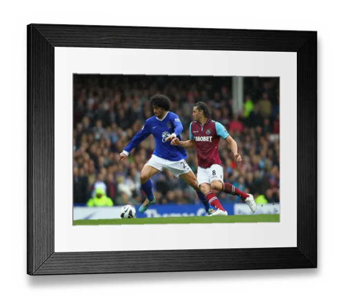Framed Print : Fellaini vs. Carroll: Everton's Battle for Victory (2-0 vs. West Ham United, Barclays Premier League) Framed Print : Fellaini vs. Carroll: Everton's Battle for Victory (2-0 vs. West Ham United, Barclays Premier League)