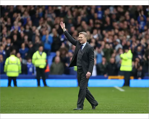 Everton manager David Moyes waves to the fans after the match