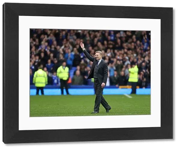 Everton manager David Moyes waves to the fans after the match