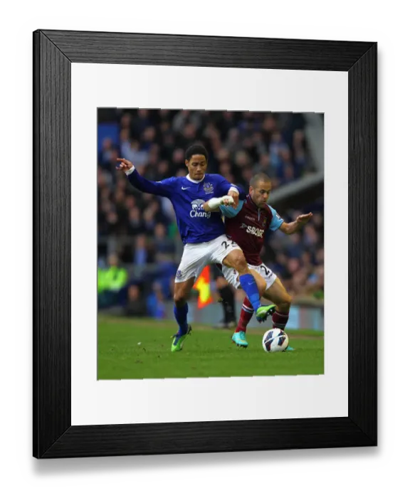 Framed Print : Battle at Goodison Park: Pienaar vs. Cole Clash (Everton's 2-0 Victory) Framed Print : Battle at Goodison Park: Pienaar vs. Cole Clash (Everton's 2-0 Victory)