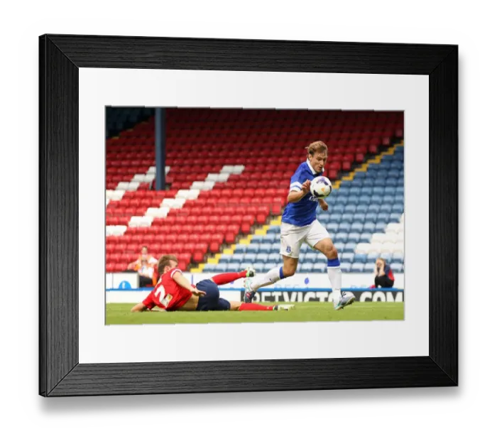 Framed Print : Jelavic Scores Past Kane: Everton's Pre-Season Victory Over Blackburn Rovers (3-1)