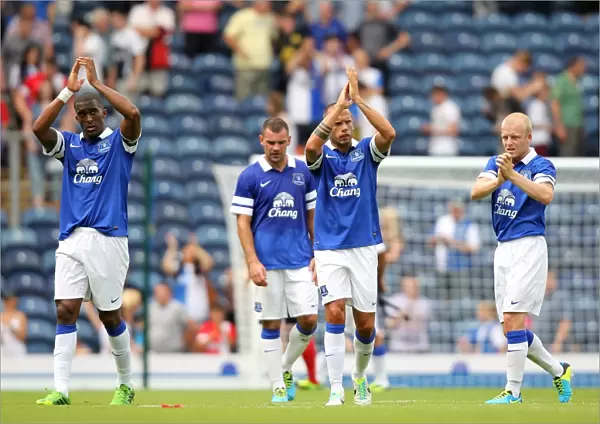 Everton's Distin, Heitinga, and Naismith Celebrate Pre-Season Victory Over Blackburn Rovers