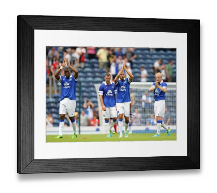 Framed Print : Everton's Distin, Heitinga, and Naismith Celebrate Pre-Season Victory Over Blackburn Rovers