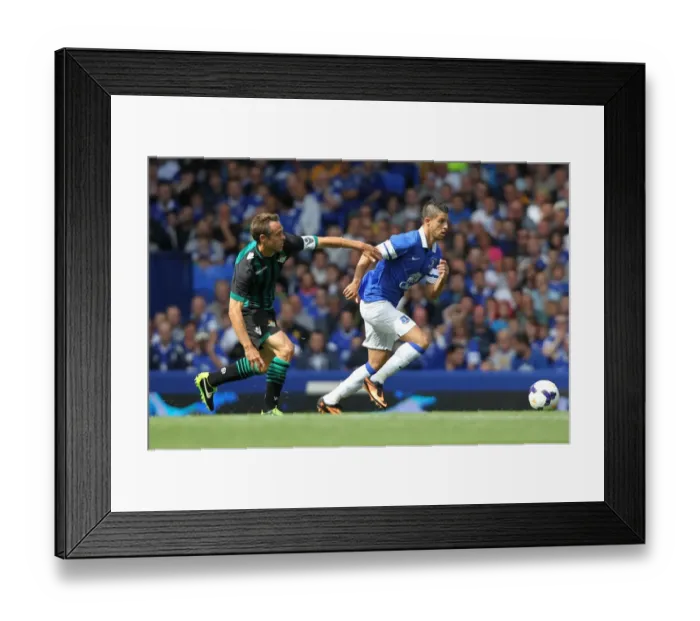 Framed Print : Nacho vs. Mirallas: A Pivotal Moment in Everton's Pre-Season Victory over Real Betis (11-08-2013)