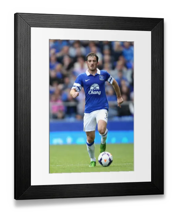 Framed Print : Leighton Baines Leadership: Everton Edge Past Real Betis 2-1 in Pre-Season Clash (11-08-2013)