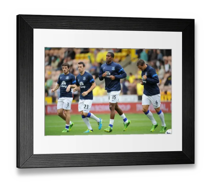 Framed Print : Everton Squad Gearing Up: Leighton Baines, Seamus Coleman, Sylvain Distin, and Phil Jagielka in Pre-Match Warm-Up vs Norwich City, August 2013 (Carrow Road) Framed Print : Everton Squad Gearing Up: Leighton Baines, Seamus Coleman, Sylvain Distin, and Phil Jagielka in Pre-Match Warm-Up vs Norwich City, August 2013 (Carrow Road)