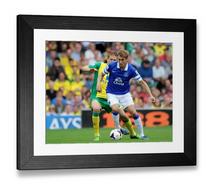 Framed Print : Intense Rivalry: Jelavic vs Turner's Battle for Ball in Everton's Draw with Norwich City (BPL 2013)