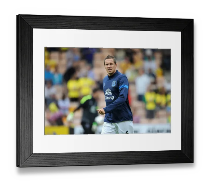 Framed Print : Phil Jagielka's Heroic Defensive Stand: Norwich City vs. Everton (2-2 Stalemate, Carrow Road, August 17, 2013)