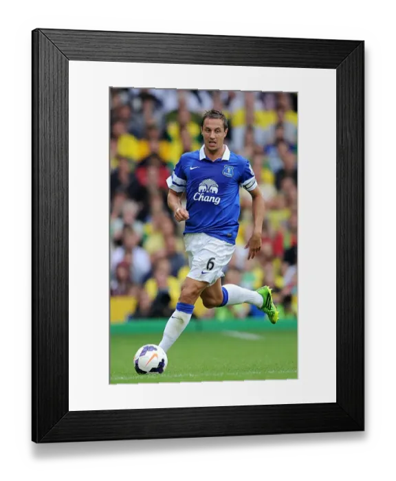 Framed Print : Defiant Jagielka: Everton Hold Norwich City to 2-2 Stalemate in Premier League Opener (August 17, 2013, Carrow Road) Framed Print : Defiant Jagielka: Everton Hold Norwich City to 2-2 Stalemate in Premier League Opener (August 17, 2013, Carrow Road)