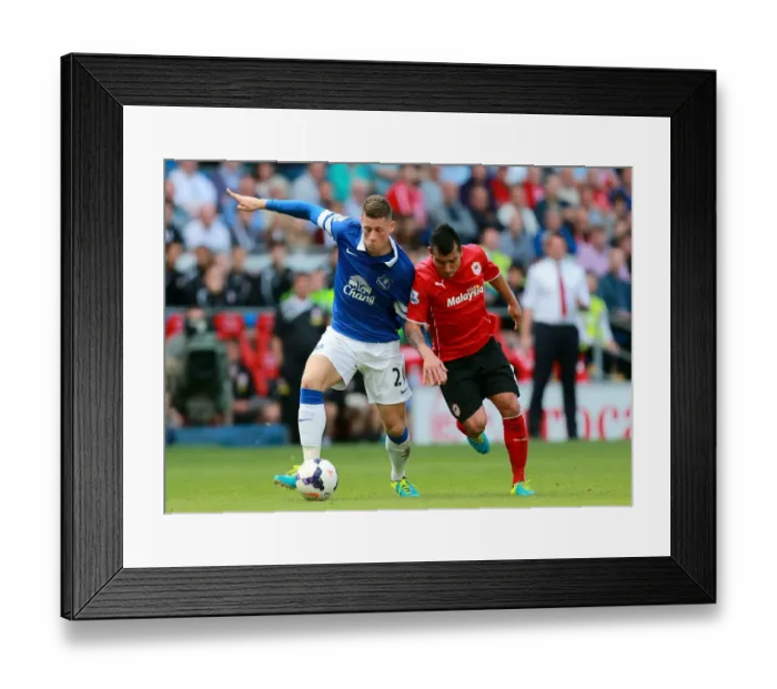 Framed Print : Battle for the Ball: Ross Barkley vs Gary Medel - A Premier League Clash at Cardiff City (31-08-2013) Framed Print : Battle for the Ball: Ross Barkley vs Gary Medel - A Premier League Clash at Cardiff City (31-08-2013)