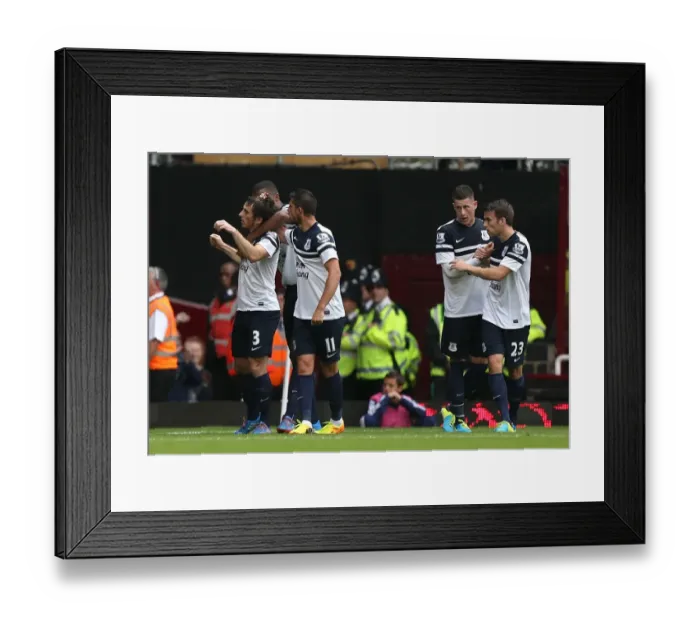 Framed Print : Leighton Baines Scores Thrilling First Goal as Everton Defeats West Ham 3-2 (BPL 2013-14: Upton Park) Framed Print : Leighton Baines Scores Thrilling First Goal as Everton Defeats West Ham 3-2 (BPL 2013-14: Upton Park)