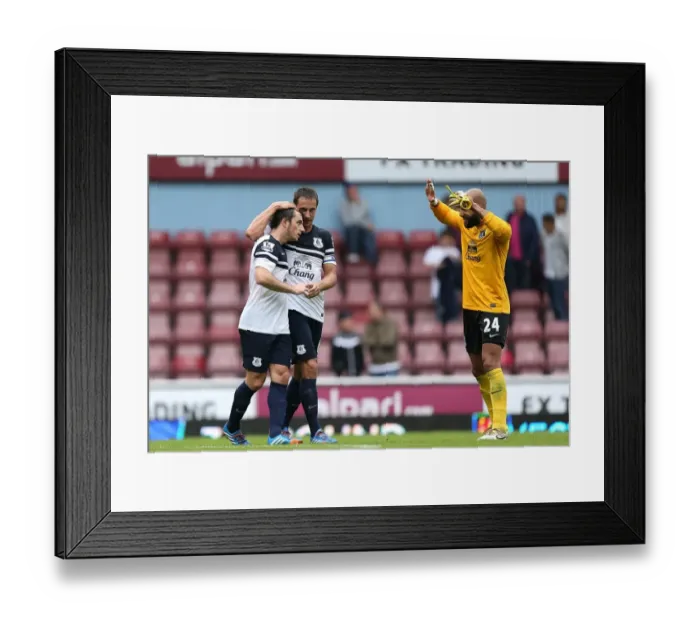 Framed Print : Everton's Triumph: Celebrating a 3-2 Win Over West Ham United with Leighton Baines, Phil Jagielka, and Tim Howard Framed Print : Everton's Triumph: Celebrating a 3-2 Win Over West Ham United with Leighton Baines, Phil Jagielka, and Tim Howard