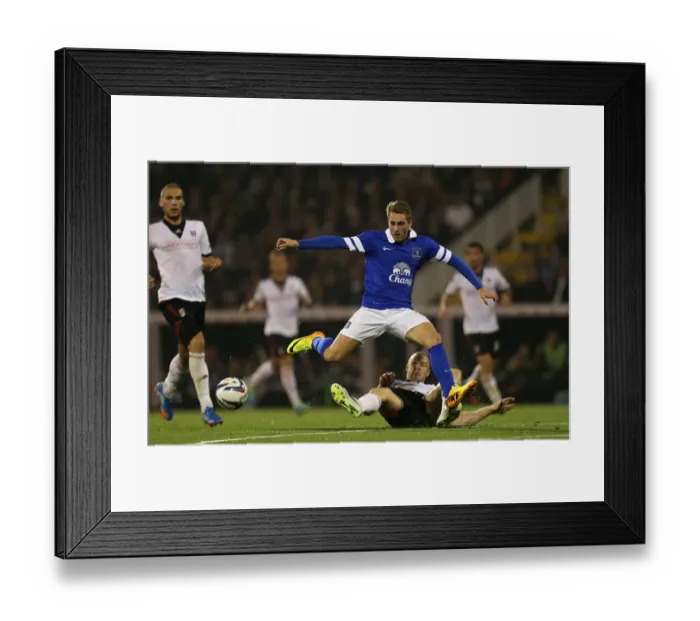 Framed Print : Deulofeu's Determination: Everton's Triumph Over Fulham in the Capital One Cup (Gerard Deulofeu vs Brede Hangeland) Framed Print : Deulofeu's Determination: Everton's Triumph Over Fulham in the Capital One Cup (Gerard Deulofeu vs Brede Hangeland)