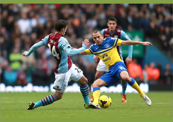 Battle for the Ball: Tonev vs. Osman in Aston Villa vs. Everton's Intense Premier League Clash at Villa Park (26-10-2013)