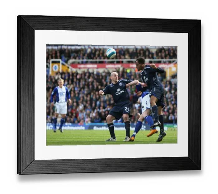 Framed Print : Defending Duo: Lescott and Carsley Shield Everton Against Birmingham Attack in Barclays Premier League, 2007-08 Framed Print : Defending Duo: Lescott and Carsley Shield Everton Against Birmingham Attack in Barclays Premier League, 2007-08