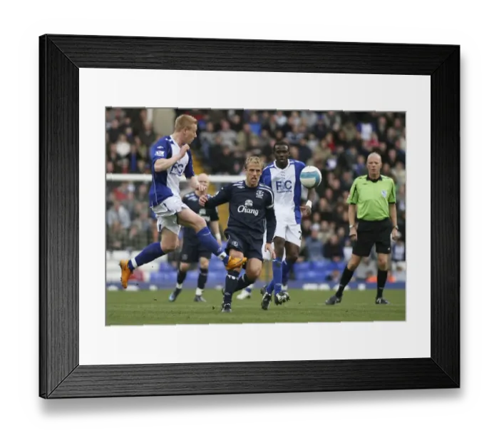 Framed Print : Phil Neville vs. Mikael Forssell: A Battle in the Barclays Premier League - Birmingham City vs. Everton, April 2008 Framed Print : Phil Neville vs. Mikael Forssell: A Battle in the Barclays Premier League - Birmingham City vs. Everton, April 2008