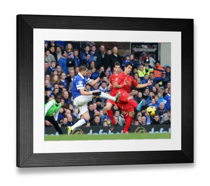 Framed Print : Intense Rivalry: Mirallas Tackles Suarez - Everton vs Liverpool (23-11-2013)
