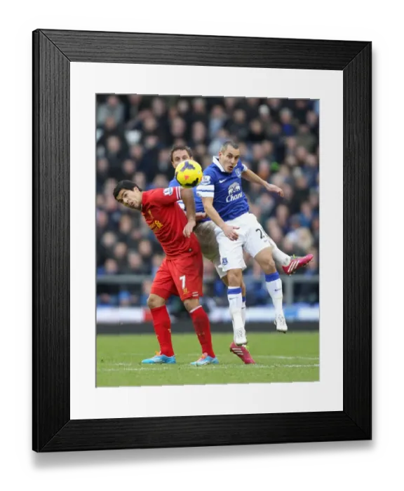 Framed Print : Clash at Goodison: Osman and Jagielka vs. Suarez - Everton vs. Liverpool (3-3) Framed Print : Clash at Goodison: Osman and Jagielka vs. Suarez - Everton vs. Liverpool (3-3)
