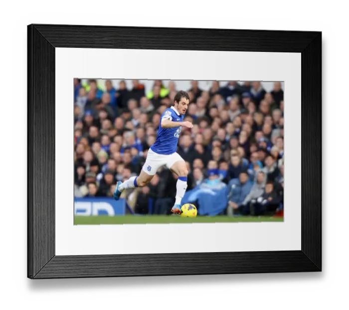 Framed Print : Thrilling 3-3 Rivalry: Everton vs Liverpool - Leighton Baines Leading Performance