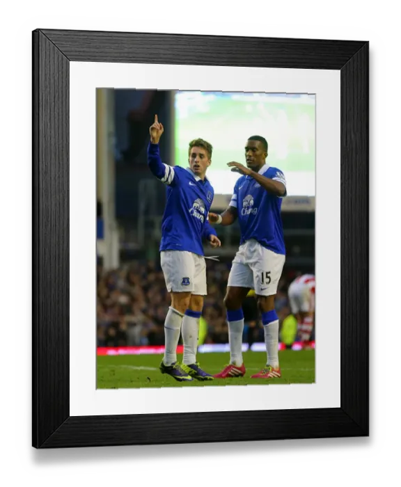 Framed Print : Deulofeu and Distin: Everton's Unforgettable Goal Celebration vs Stoke City (4-0) Framed Print : Deulofeu and Distin: Everton's Unforgettable Goal Celebration vs Stoke City (4-0)