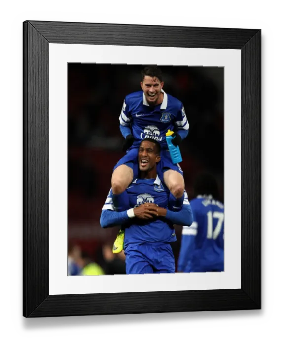 Framed Print : Everton's Historic Victory at Old Trafford: Bryan Oviedo and Sylvain Distin Celebrate Manchester United 0-1 Everton (December 4, 2013) Framed Print : Everton's Historic Victory at Old Trafford: Bryan Oviedo and Sylvain Distin Celebrate Manchester United 0-1 Everton (December 4, 2013)