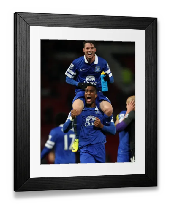 Framed Print : Everton's Historic 1-0 Victory Over Manchester United: Bryan Oviedo and Sylvain Distin's Emotional Celebration (December 4, 2013, Old Trafford) Framed Print : Everton's Historic 1-0 Victory Over Manchester United: Bryan Oviedo and Sylvain Distin's Emotional Celebration (December 4, 2013, Old Trafford)