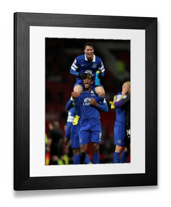 Framed Print : Everton's Historic Upset: Bryan Oviedo and Sylvain Distin Celebrate 1-0 Victory at Old Trafford (December 4, 2013, Barclays Premier League) Framed Print : Everton's Historic Upset: Bryan Oviedo and Sylvain Distin Celebrate 1-0 Victory at Old Trafford (December 4, 2013, Barclays Premier League)