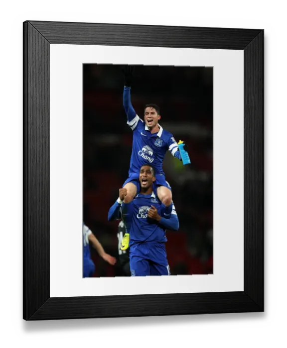 Framed Print : Everton's Bryan Oviedo and Sylvain Distin: Celebrating a Historic 1-0 Victory Over Manchester United at Old Trafford (December 2013) Framed Print : Everton's Bryan Oviedo and Sylvain Distin: Celebrating a Historic 1-0 Victory Over Manchester United at Old Trafford (December 2013)