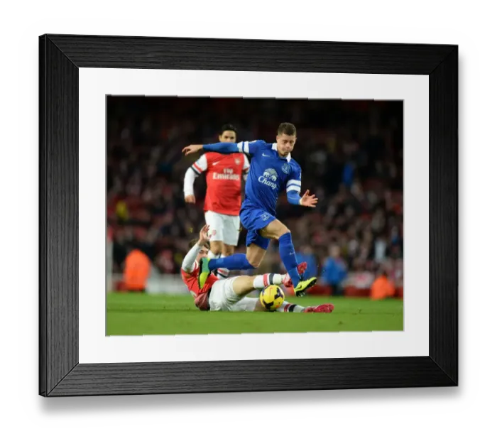 Framed Print : Intense Rivalry: Ramsey vs. Barkley Tackle in Arsenal vs. Everton Premier League Showdown (Arsenal 1-1 Everton, Emirates Stadium, 08-12-2013) Framed Print : Intense Rivalry: Ramsey vs. Barkley Tackle in Arsenal vs. Everton Premier League Showdown (Arsenal 1-1 Everton, Emirates Stadium, 08-12-2013)