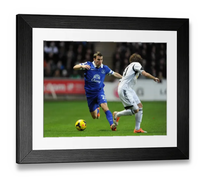 Framed Print : Battle for the Ball: Seamus Coleman's Triumph over Jose Alberto Canas (Everton's Victory at Swansea City, 22-12-2013) Framed Print : Battle for the Ball: Seamus Coleman's Triumph over Jose Alberto Canas (Everton's Victory at Swansea City, 22-12-2013)