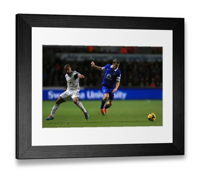 Framed Print : Battle for the Ball: Seamus Coleman vs. Wayne Routledge - Everton's Victory over Swansea City (Liberty Stadium, Premier League) Framed Print : Battle for the Ball: Seamus Coleman vs. Wayne Routledge - Everton's Victory over Swansea City (Liberty Stadium, Premier League)