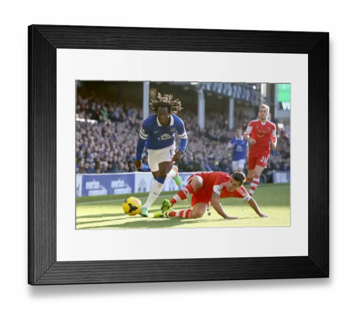 Framed Print : Lukaku vs Lovren: A Battle for the Ball in Everton's 2-1 Victory over Southampton