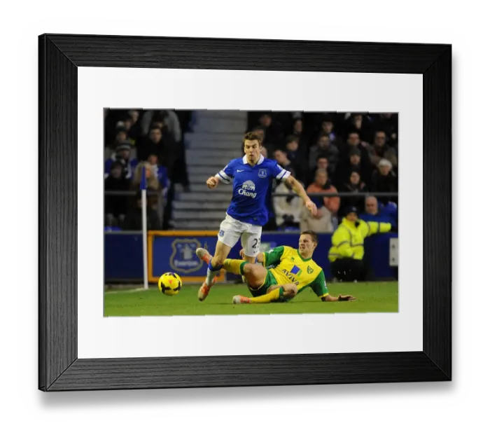 Framed Print : Battle for the Ball: Seamus Coleman vs. Ryan Bennett - Everton's Victory over Norwich City in the Barclays Premier League (11-01-2014) Framed Print : Battle for the Ball: Seamus Coleman vs. Ryan Bennett - Everton's Victory over Norwich City in the Barclays Premier League (11-01-2014)