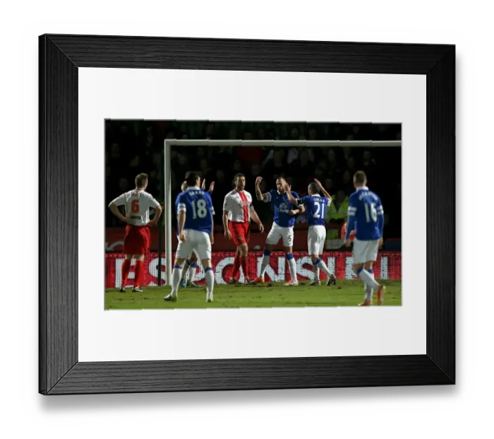 Framed Print : Everton's Johnny Heitinga: Celebrating a Triumphant Hat-trick in FA Cup Fourth Round Win Against Stevenage (25.01.2014)