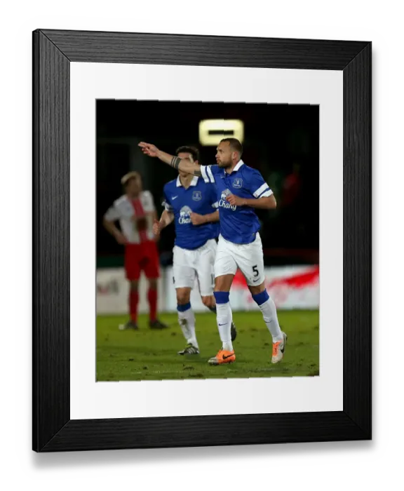 Framed Print : Everton's Johnny Heitinga: Third Goal Blitz in FA Cup Victory over Stevenage (25.01.2014) Framed Print : Everton's Johnny Heitinga: Third Goal Blitz in FA Cup Victory over Stevenage (25.01.2014)