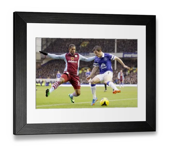 Framed Print : Intense Battle for Ball Possession: Baines vs. Bacuna - Everton vs. Aston Villa, Premier League (2014) Framed Print : Intense Battle for Ball Possession: Baines vs. Bacuna - Everton vs. Aston Villa, Premier League (2014)
