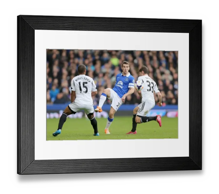 Framed Print : Seamus Coleman's Pass Thwarted: Everton's 3-2 Victory Over Swansea City (Goodison Park, 22-03-2014) Framed Print : Seamus Coleman's Pass Thwarted: Everton's 3-2 Victory Over Swansea City (Goodison Park, 22-03-2014)