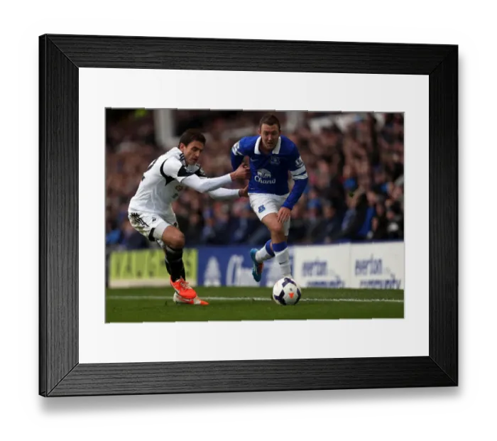Framed Print : McGeady vs Canas: Thrilling Showdown at Goodison Park - Everton vs Swansea City (22-03-2014) Framed Print : McGeady vs Canas: Thrilling Showdown at Goodison Park - Everton vs Swansea City (22-03-2014)