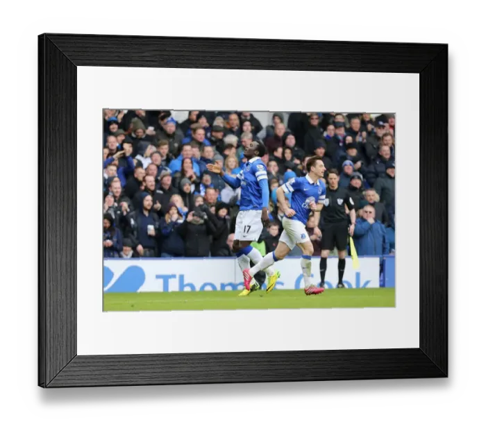 Framed Print : Everton's Double Delight: Lukaku and Baines Celebrate Second Goal vs Swansea (22-03-2014)