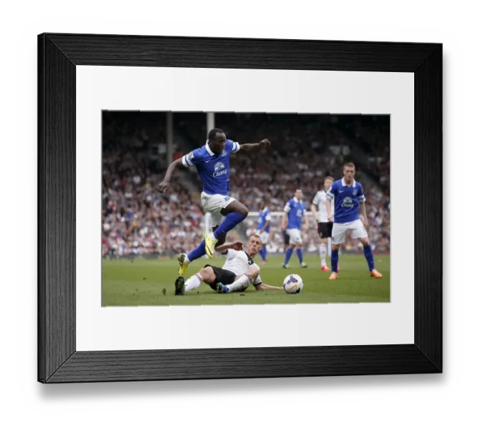Framed Print : Everton's Lukaku Leaps Past Sidwell: Everton 3-1 Fulham (30-03-2014) Framed Print : Everton's Lukaku Leaps Past Sidwell: Everton 3-1 Fulham (30-03-2014)