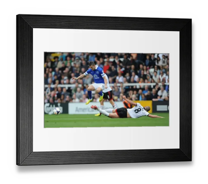Framed Print : Everton's Victory: Kasami vs Mirallas Clash in Premier League Game (30-03-2014) - Everton 3-1 Fulham