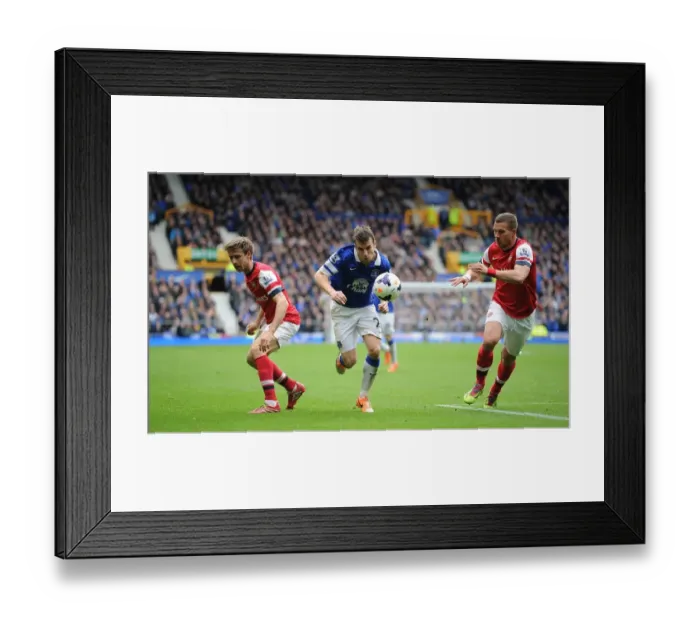 Framed Print : Monreal, Podolski, and Coleman's Intense Battle: Everton's Victory Over Arsenal (3-0, 2014) Framed Print : Monreal, Podolski, and Coleman's Intense Battle: Everton's Victory Over Arsenal (3-0, 2014)