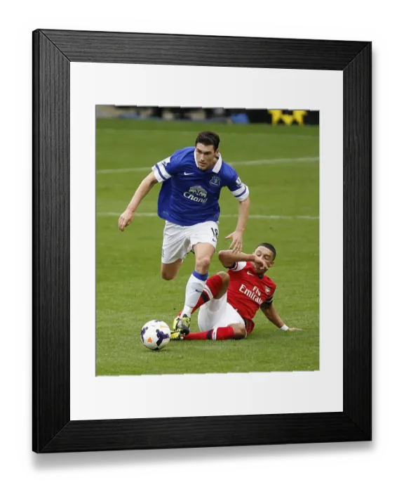 Framed Print : Battle at Goodison Park: Oxlade-Chamberlain vs. Barry - Everton's Triumph (3-0) Framed Print : Battle at Goodison Park: Oxlade-Chamberlain vs. Barry - Everton's Triumph (3-0)